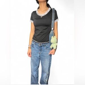 Y2K Black lace trimmed top with a charm design.